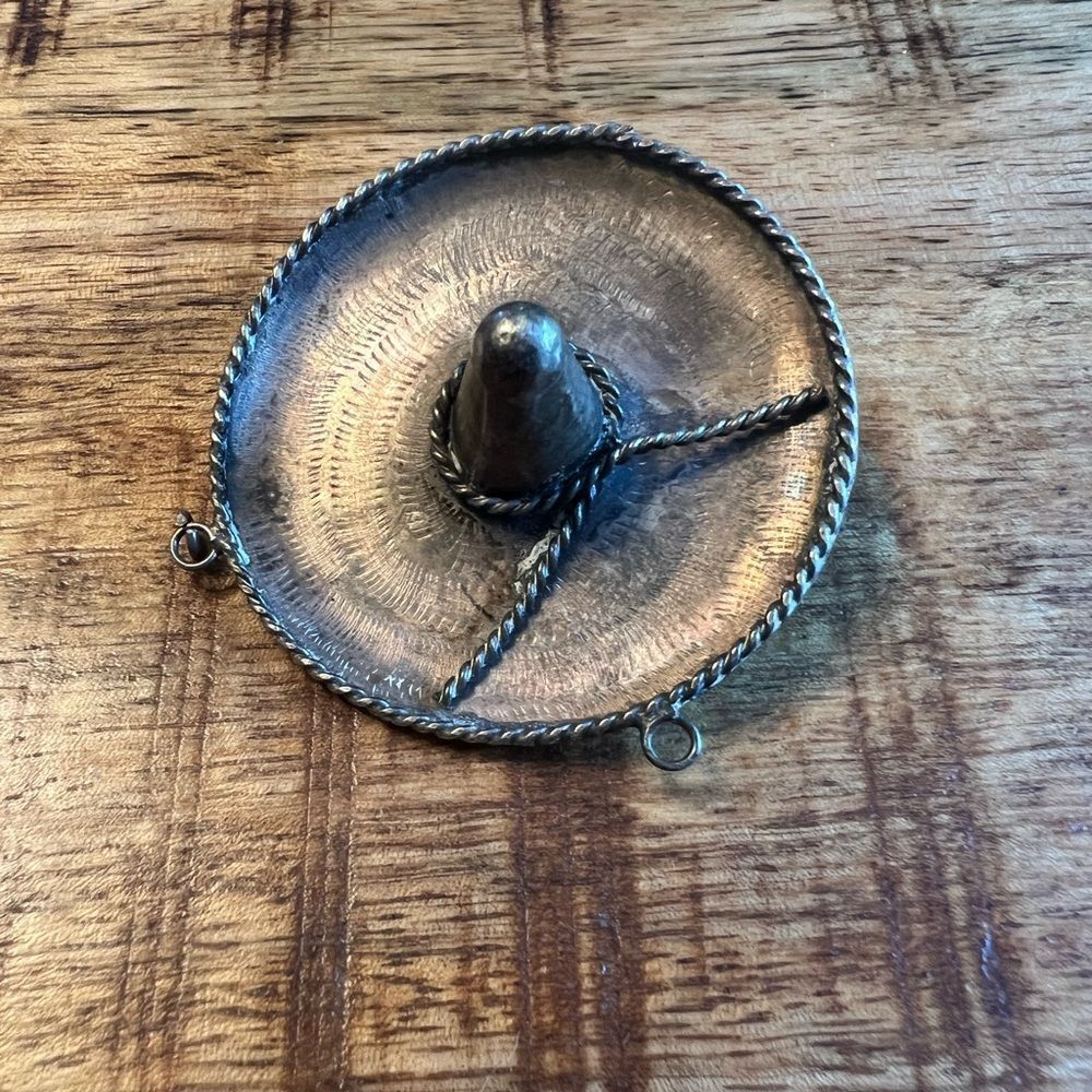 Vintage silver tone sombrero pin